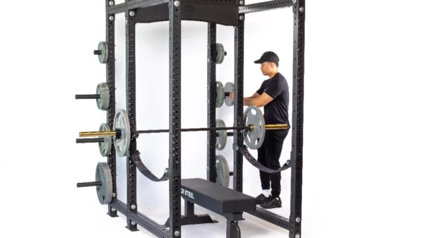 Hydra Power Rack 101 - Hydra 6 post with person setting up bench press